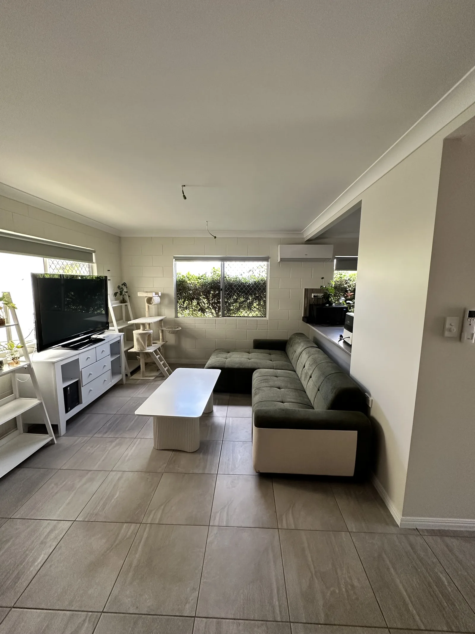 The same living space after painting, clean and finished