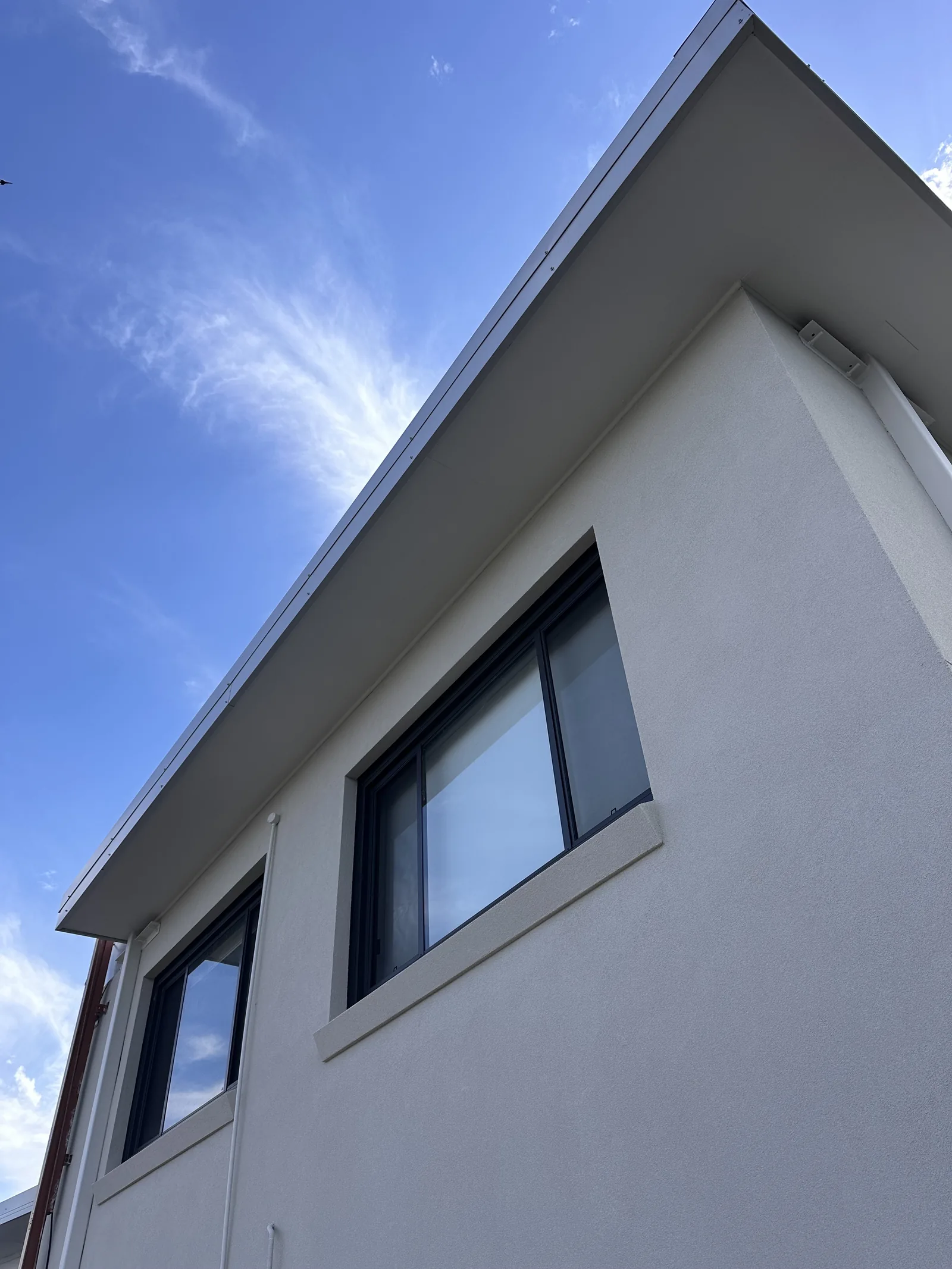 The same eaves and trim after a fresh coat